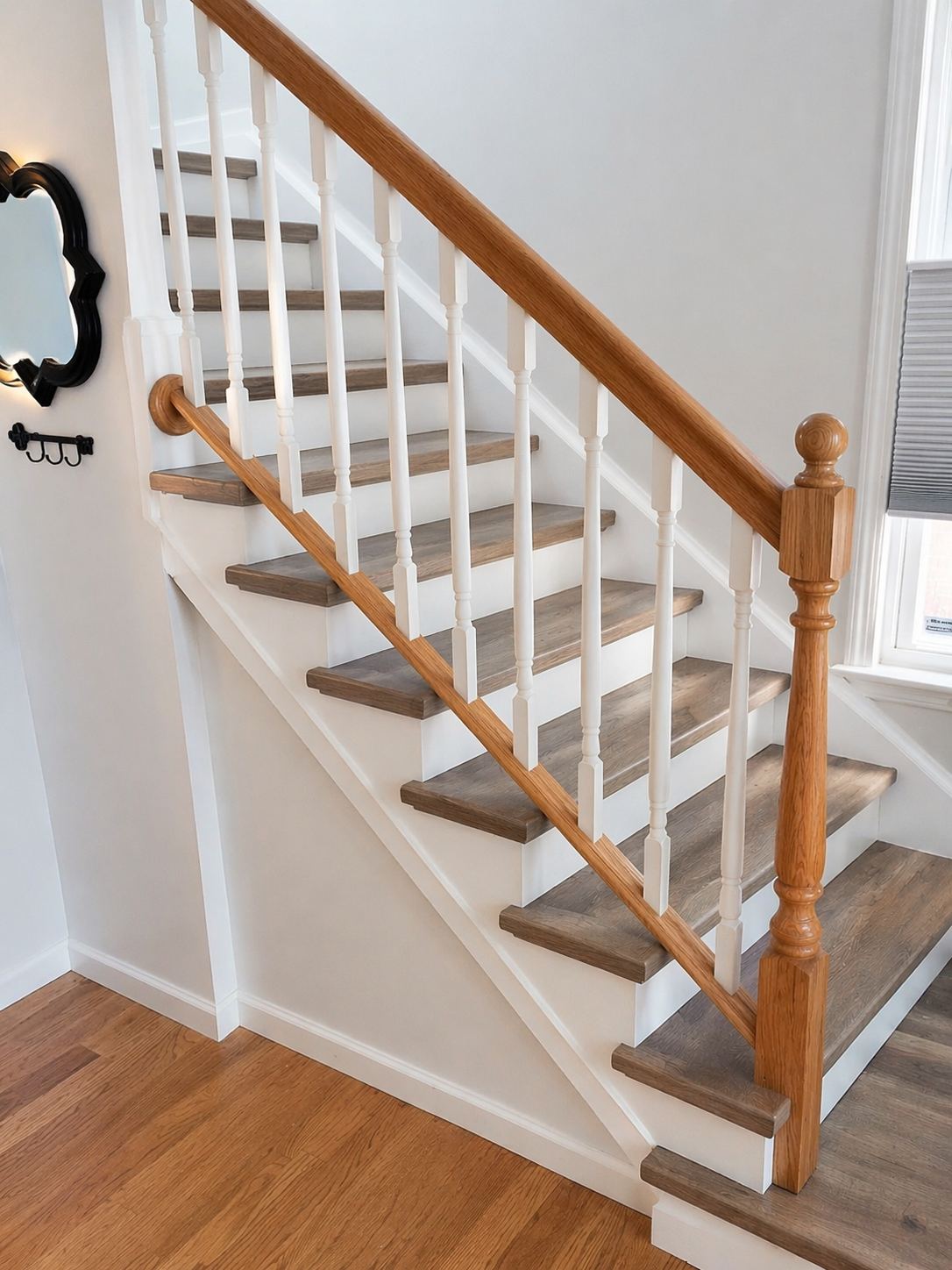 Natural light staircase with clean vinyl stair tread finish